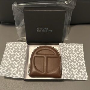 Brand new chocolate Telfar wallet. Never used.
